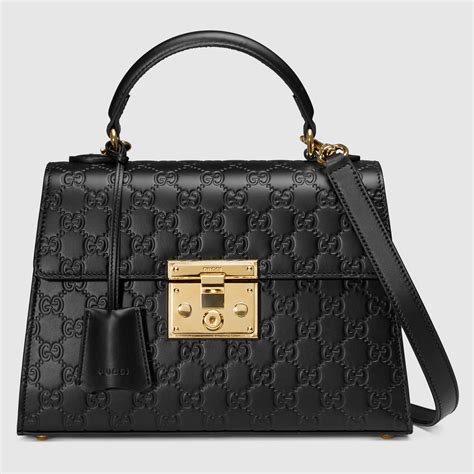 auth gucci signature foldtop chunkyclasp bag|gucci handbags logo.